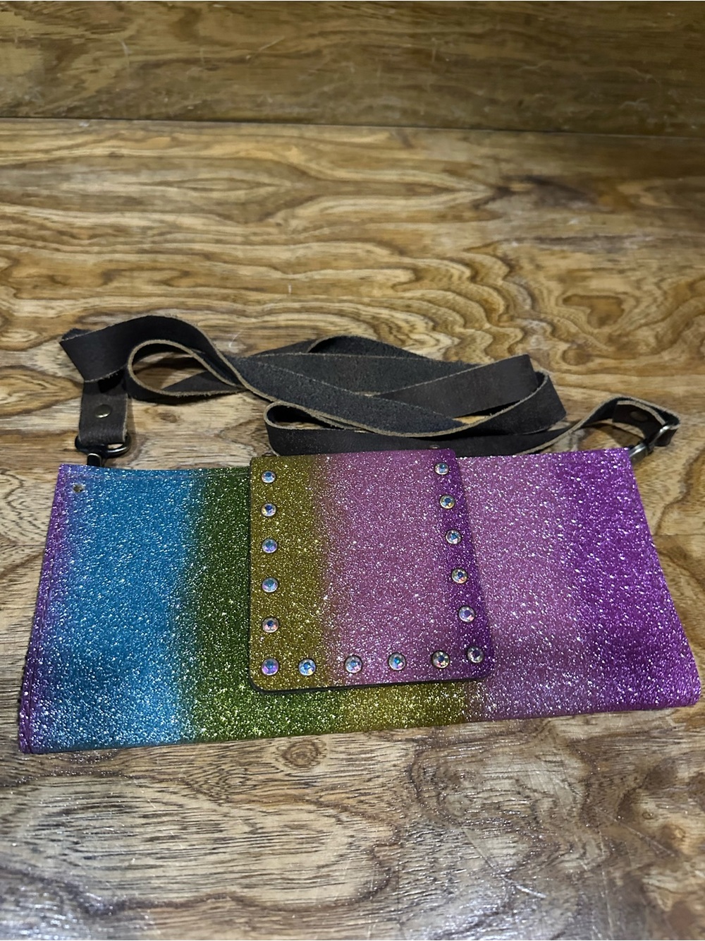 New Keep it Gypsy large leather
glitter wallet with a crossbody strap.